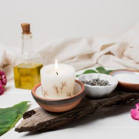 high-angle-candle-bottle-oil-composition_23-2148268403.jpg